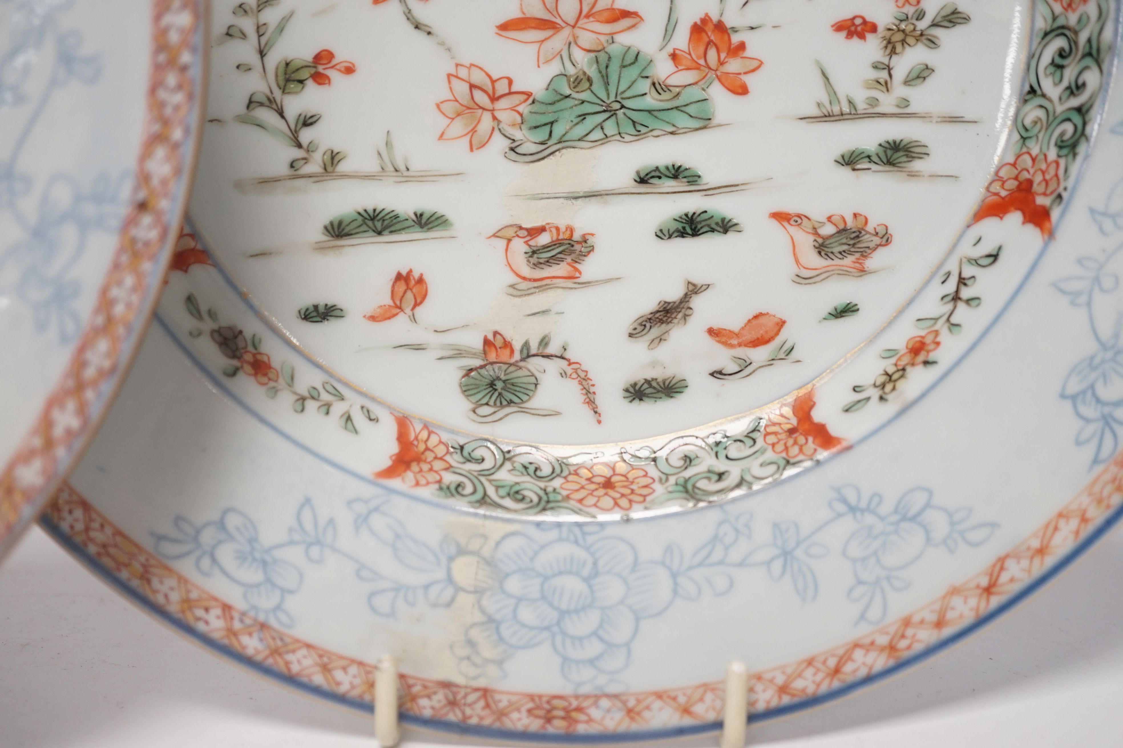 A pair of Chinese famille verte ‘lotus pond’ plates, Kangxi-Yongzheng period, 22.5cm